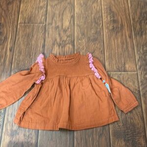 4-5 T Cat & Jack rust colored top. Light weight, button in the back. NWT